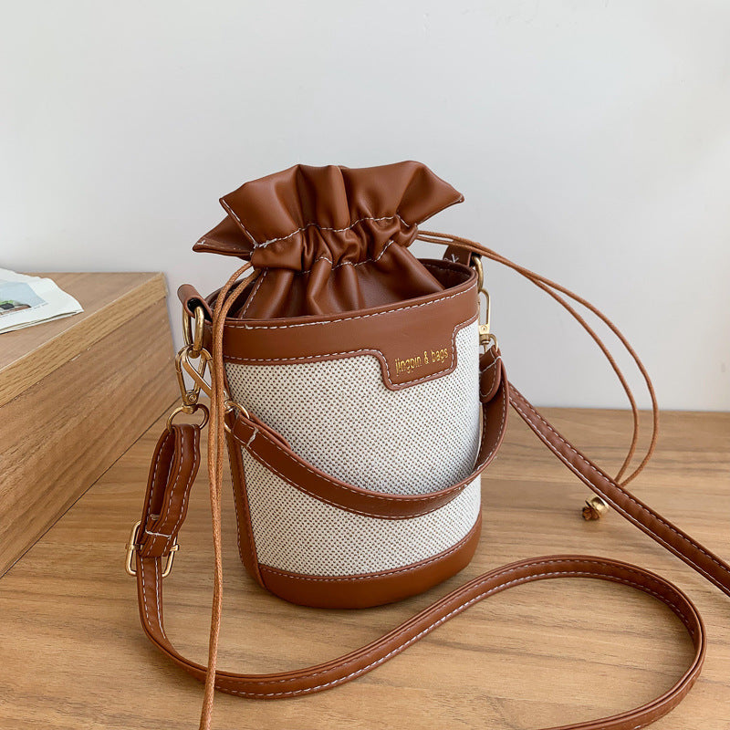 A hand-held cylindrical shoulder bag trendy retro canvas contrasting messenger bag - Mixbatch