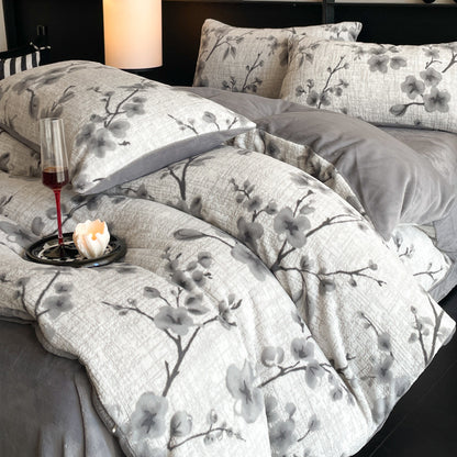 A four-piece quilt cover on the bed