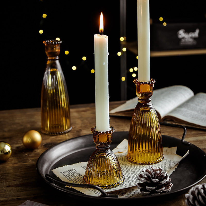 A glass candlestick ornament