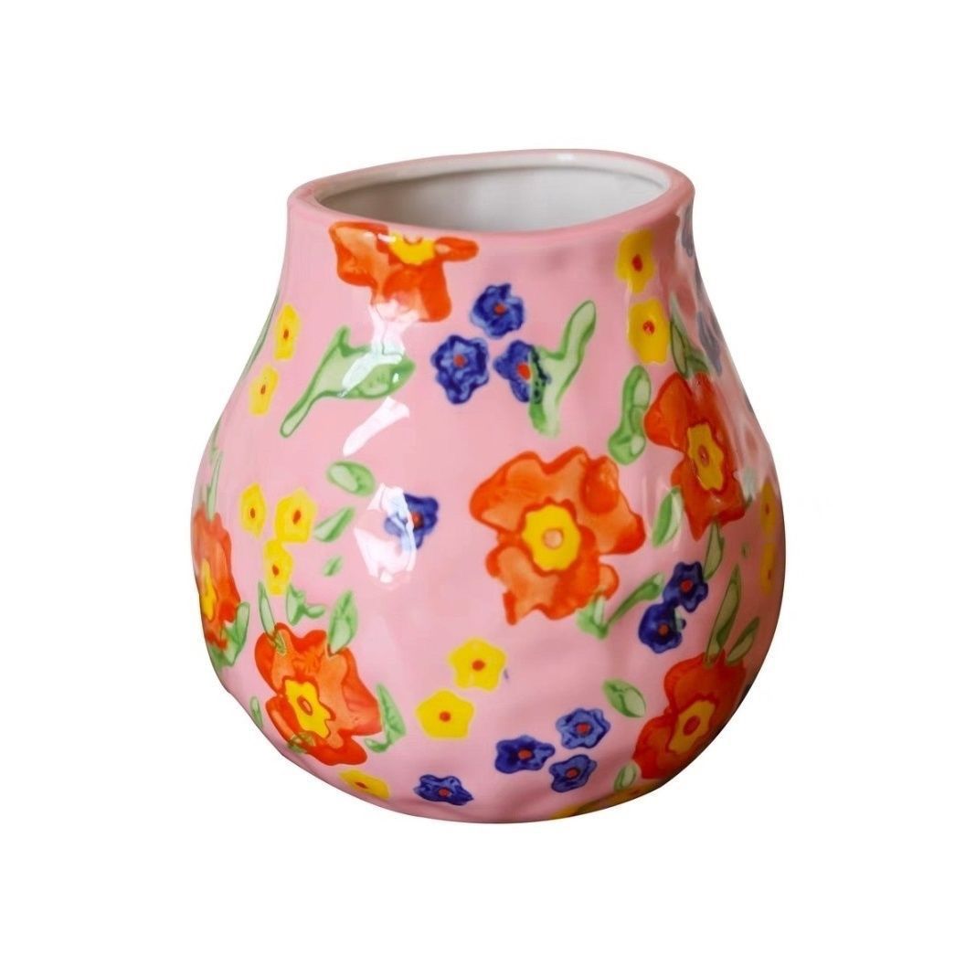 A colorful hand-painted ceramic vase ornament