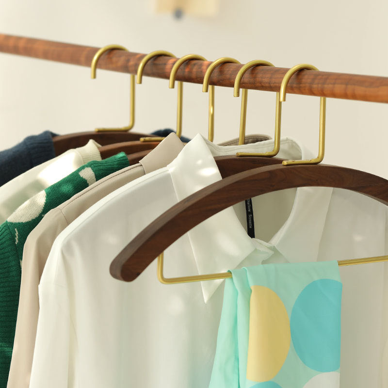 A semi-circular black walnut solid wood hanger