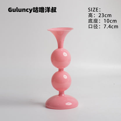 A vintage French Roman column glass candle holder