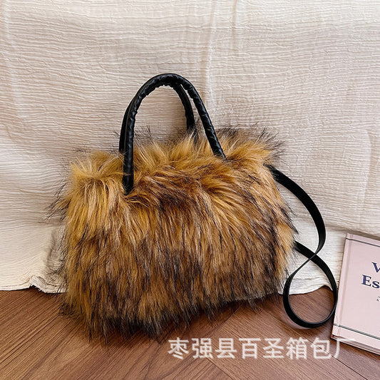 A Plush raccoon fur handbag