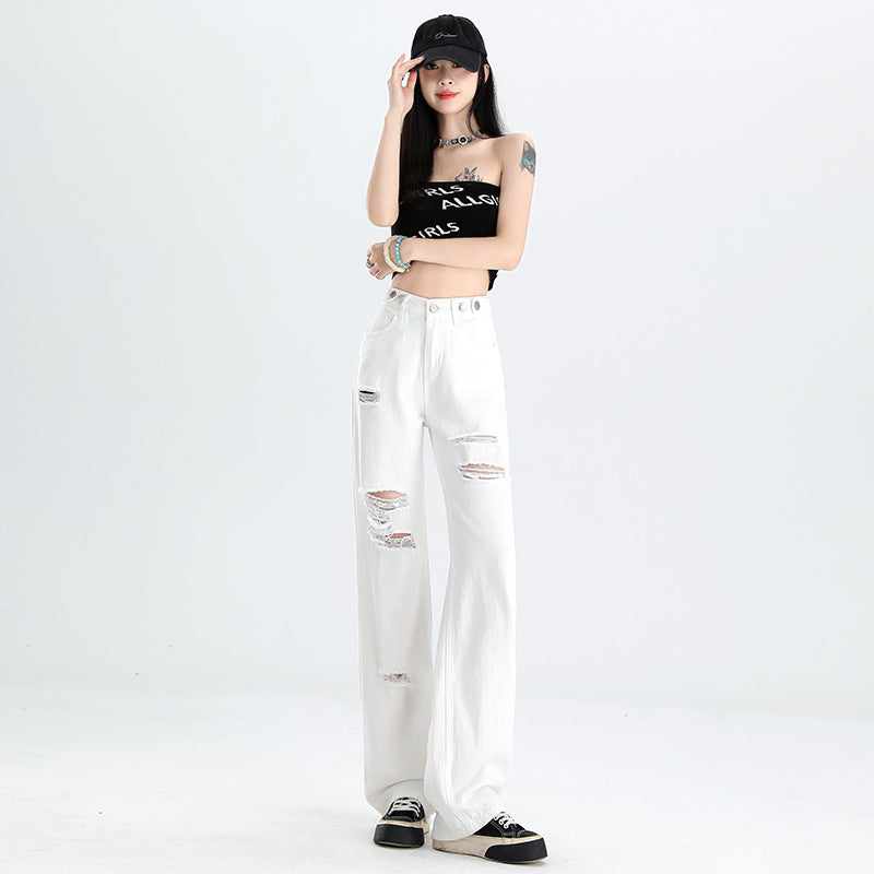 A pair of ripped white jeans