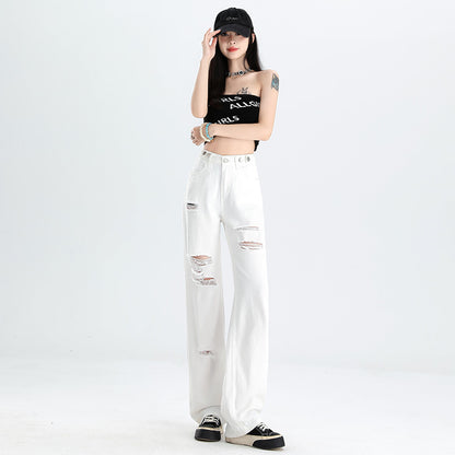 A pair of ripped white jeans
