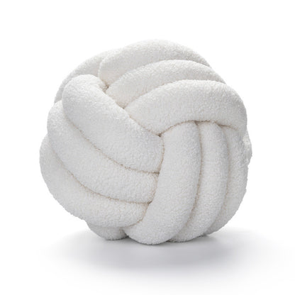A braided knotted ball pillow