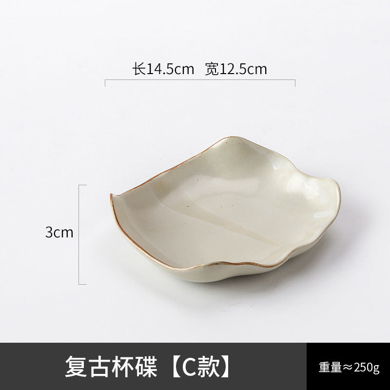 A ceramic coffee cup and saucer set