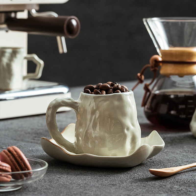 A ceramic coffee cup and saucer set