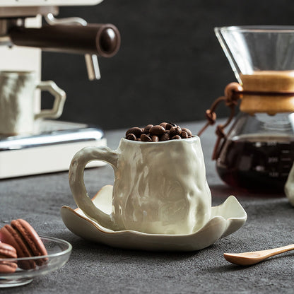 A ceramic coffee cup and saucer set