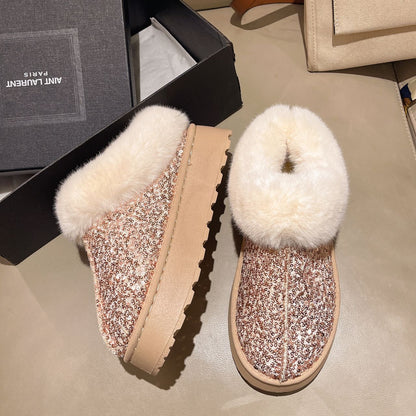 A plush sequined snow boot