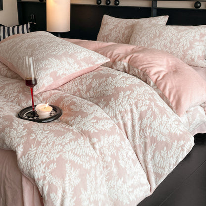 A four-piece quilt cover on the bed