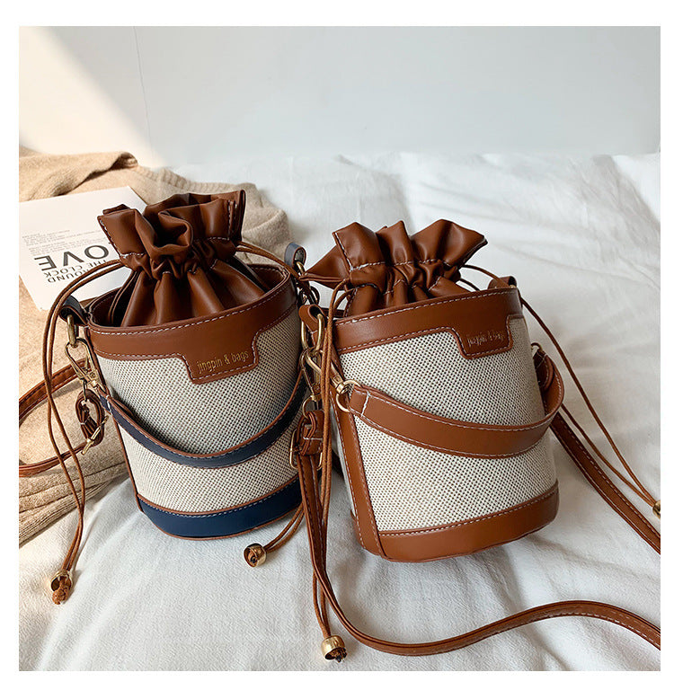 A hand-held cylindrical shoulder bag trendy retro canvas contrasting messenger bag - Mixbatch
