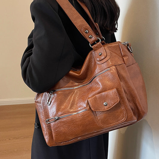 A handbag shoulder bag