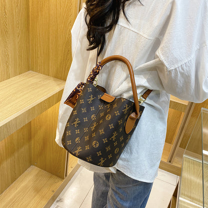 A high-end women's bag, new fashion printed mother and child bucket bag, versatile single shoulder crossbody portable cross-border bag