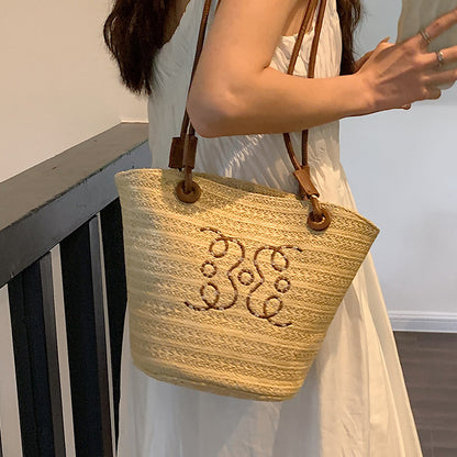 A straw bag shoulder bag
