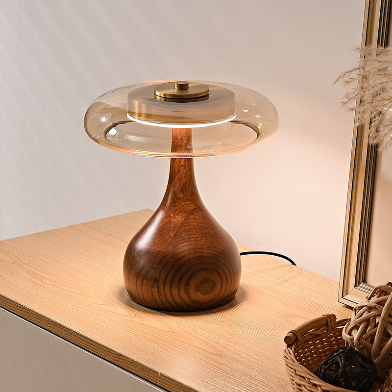 A solid wood glass table lamp