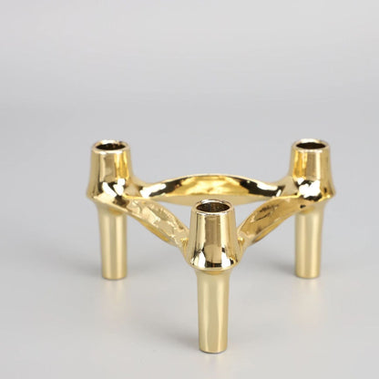 A tripod candlestick alloy decorative ornament