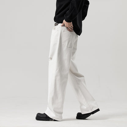 A straight white ripped jeans fashion trendy long pants