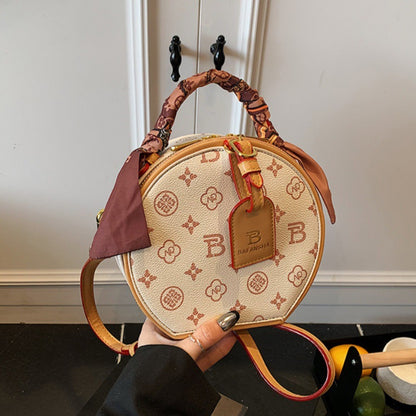 A new high-end printed apple bag niche light luxury fashion versatile shoulder messenger bag portable round cake bag