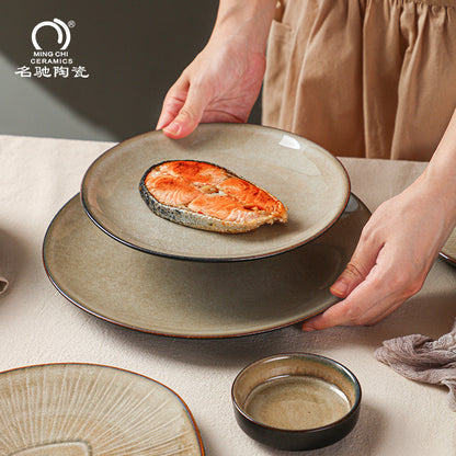 A Japanese-style kiln-changed retro coffee gold creative ceramics simple high-end light luxury cup, bowl, plate and tableware combination set