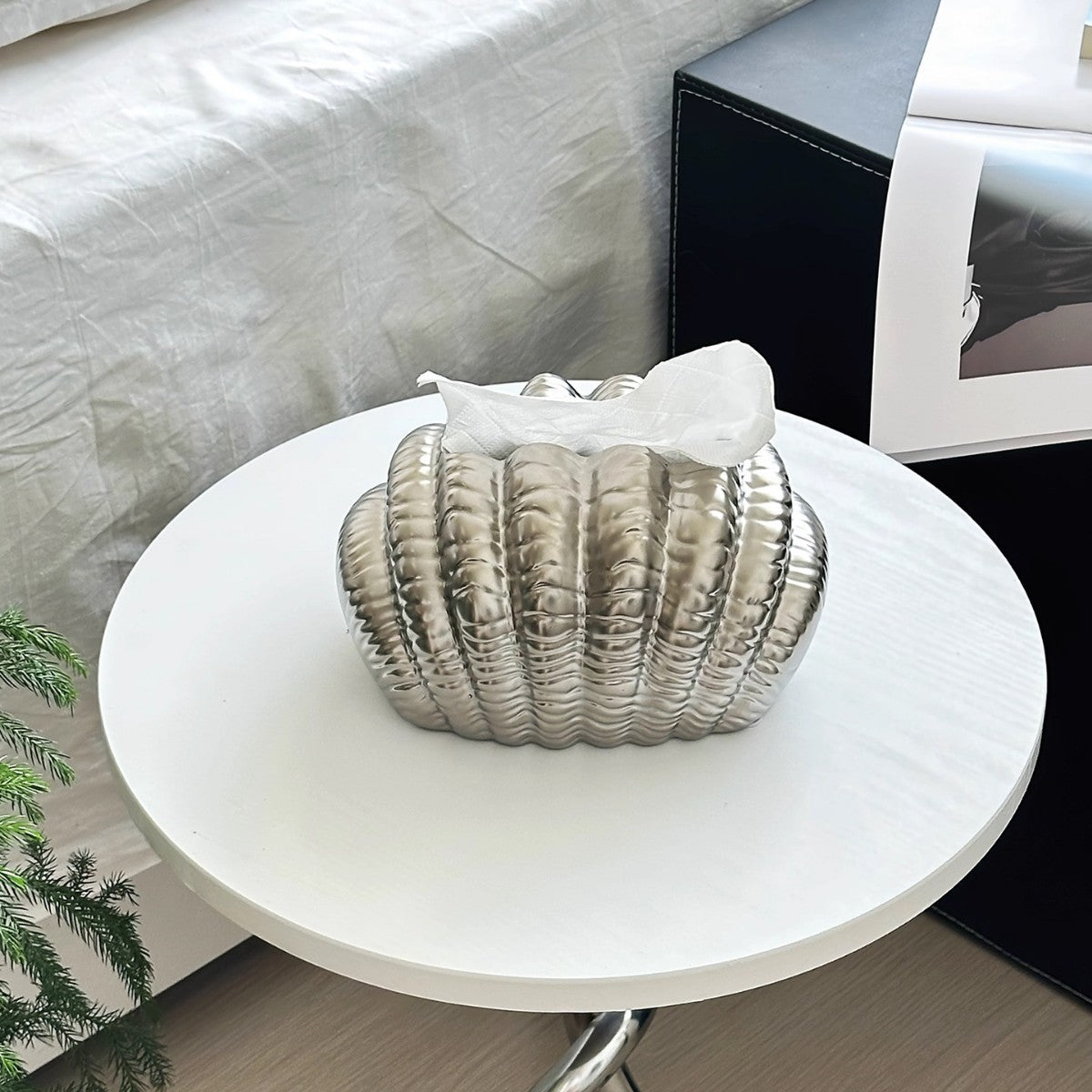 A ceramic tissue box ornament