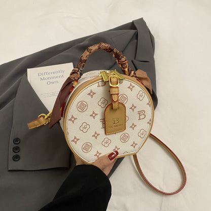 A new high-end printed apple bag niche light luxury fashion versatile shoulder messenger bag portable round cake bag