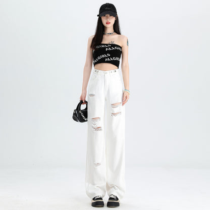A pair of ripped white jeans
