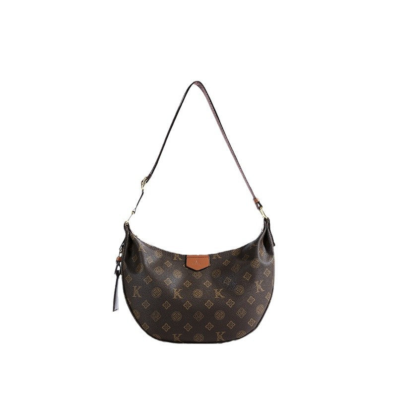 A new versatile large-capacity commuting dumpling bag retro printed messenger bag bag female