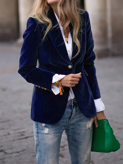 A gold velvet blazer
