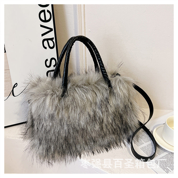A Plush raccoon fur handbag