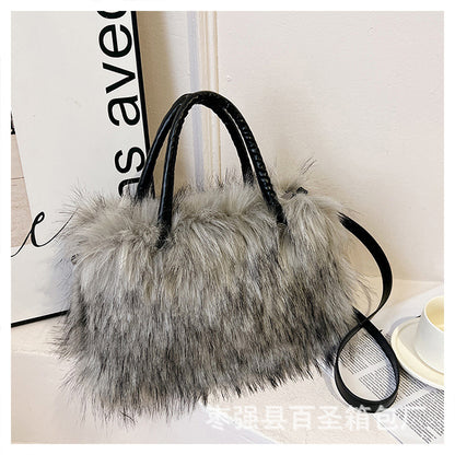 A Plush raccoon fur handbag