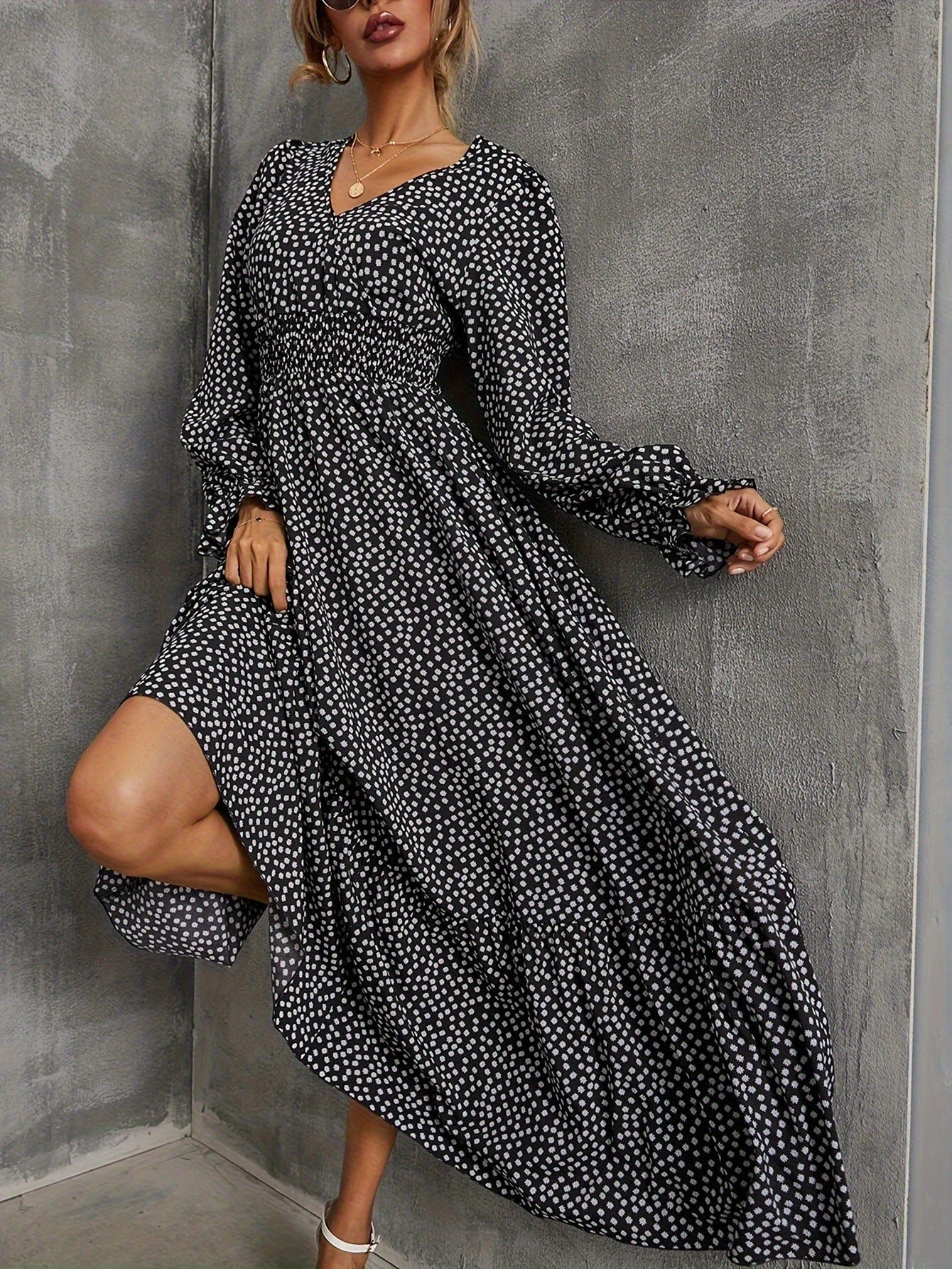 A long-sleeved V-neck dress
