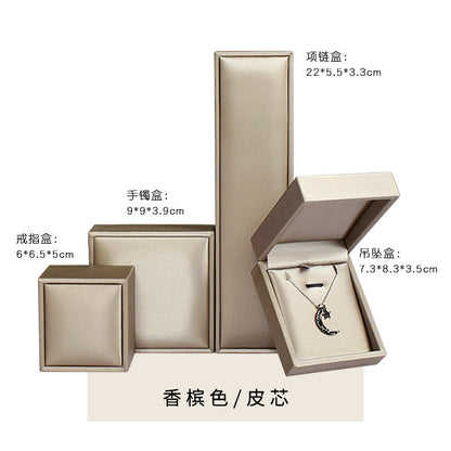 A brushed PU leather bronzing LOGO jewelry box