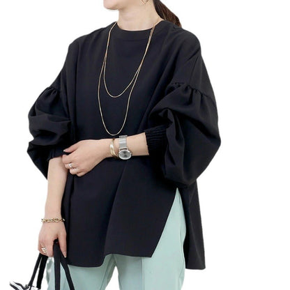 A crewneck long-sleeved top