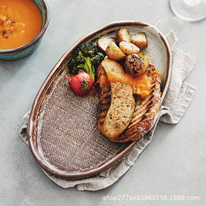 A handmade ceramic cup and saucer set