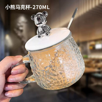 A bear mug a glass cup
