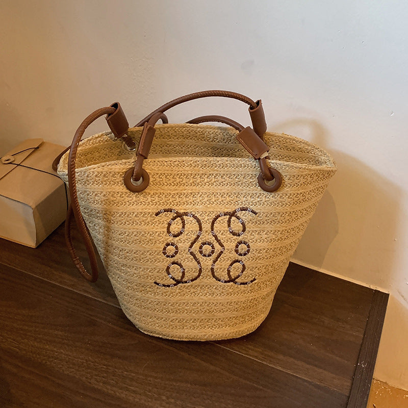 A straw bag shoulder bag