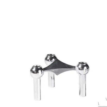 A tripod candlestick alloy decorative ornament