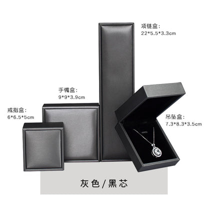 A brushed PU leather bronzing LOGO jewelry box