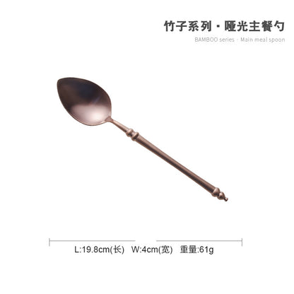 A stainless steel knife and fork set