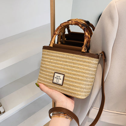A summer new textured bamboo handle woven bag Thailand travel vacation fashion messenger straw bag