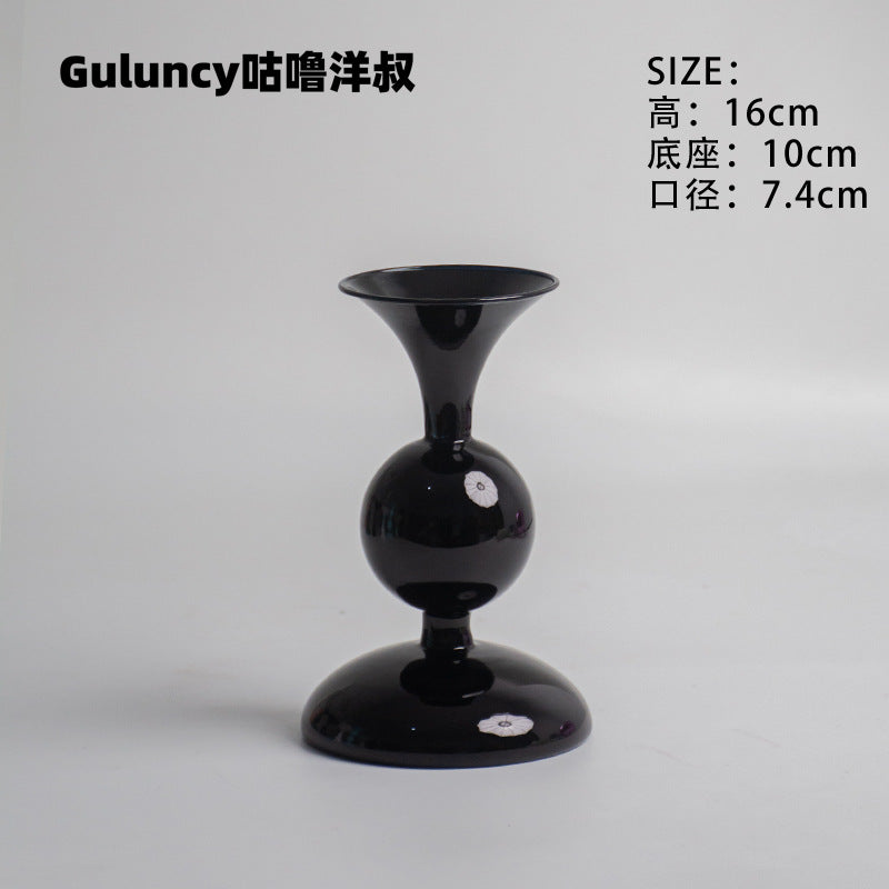 A vintage French Roman column glass candle holder