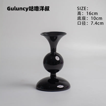 A vintage French Roman column glass candle holder