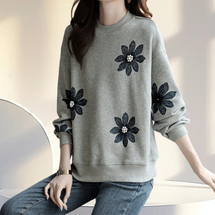 A flower beaded sweater