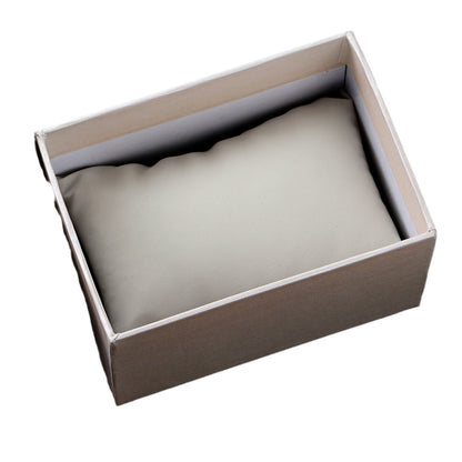 A product packaging box, white cardboard watch box.