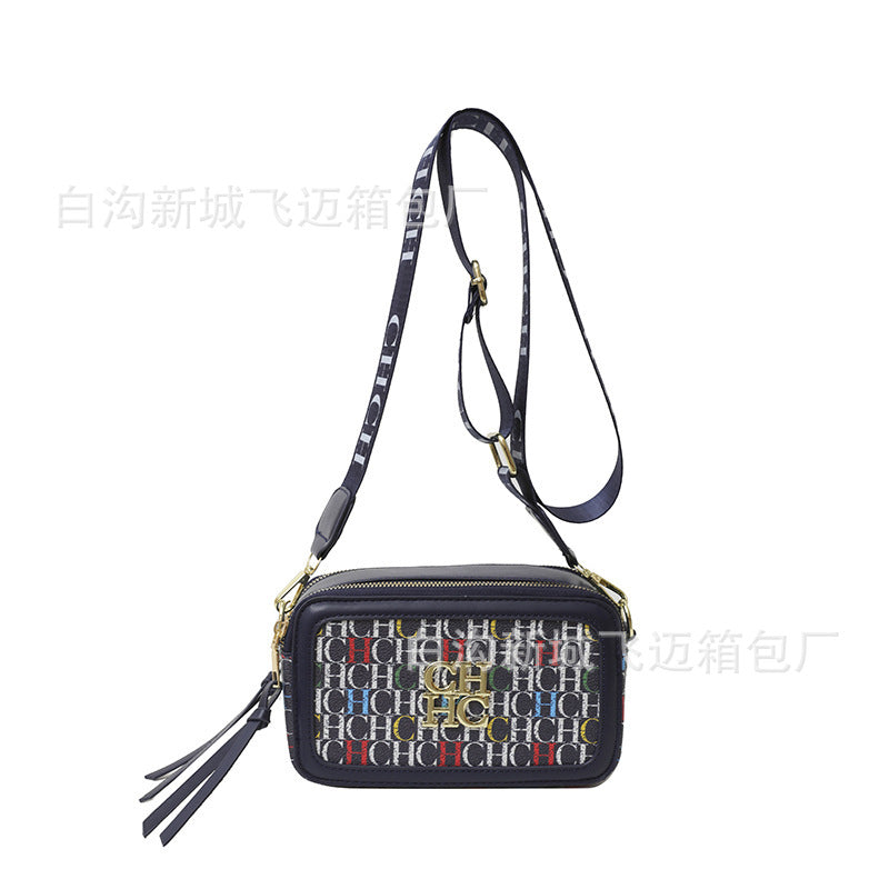 A Europe and the United States new personality letter style color fashion popular letter solid color shoulder messenger bag tide