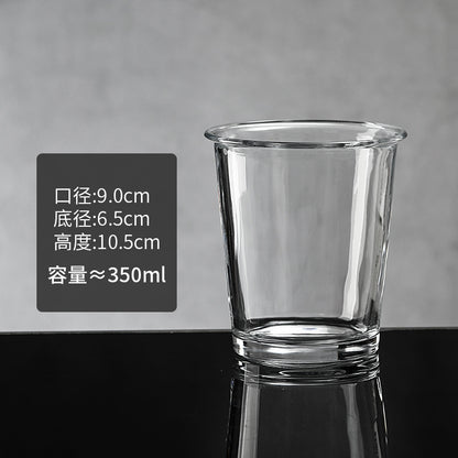 A transparent glass water cup