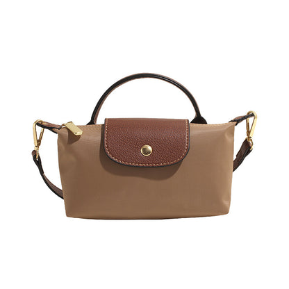 A new Oxford cloth women's bag fashion splicing dumpling bag simple handbag premium texture commuter bag