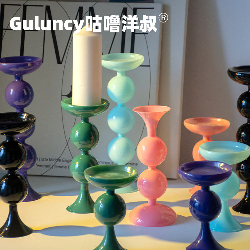 A vintage French Roman column glass candle holder