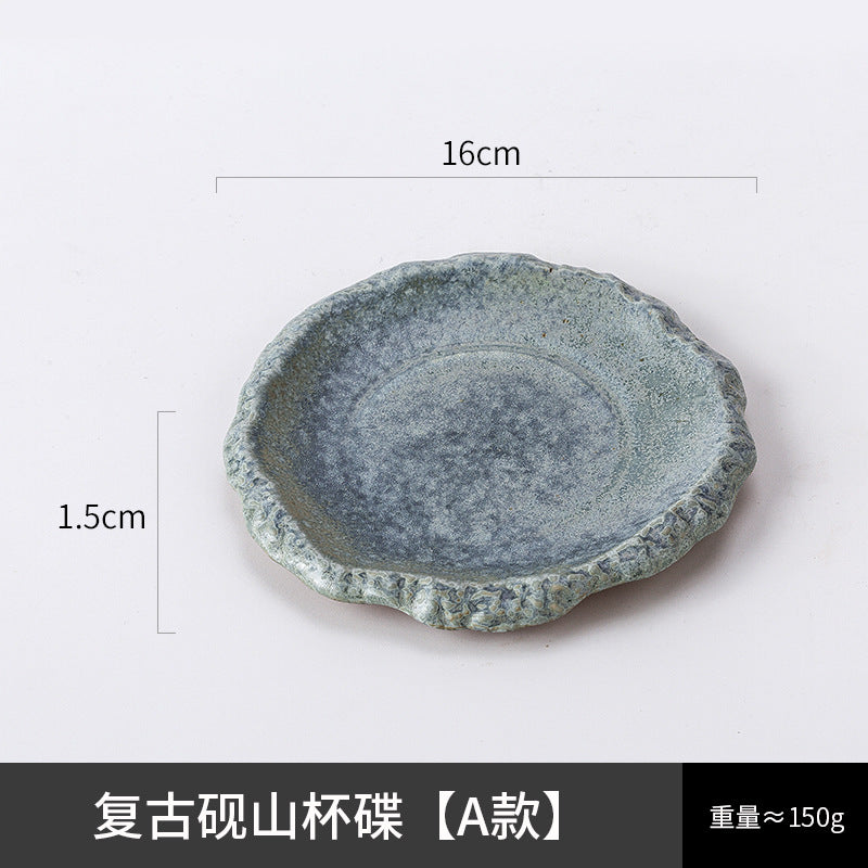 A ceramic coffee cup and saucer set